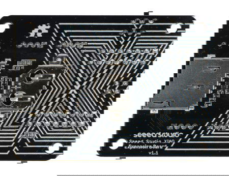 Sloty pro kartu microSD a baterii CR1220 jsou umístěny na zadní straně desky.