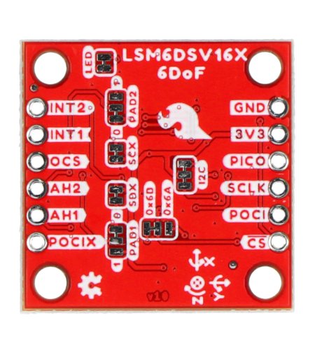Červený modul senzoru IMU leží obráceně na bílém pozadí.